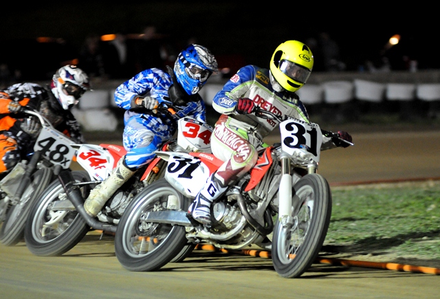 Three-time AMA Grand National winner Danny Ingram (No. 31) leads Andrew Butler (34F) and Sam Lowe (48X) in Heat race action Saturday night at Mid-America Speedway in Indianapolis. (Larry Lawrence photo)