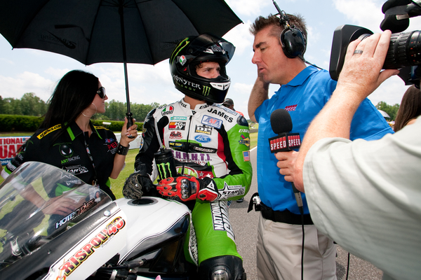 Rispoli - AW (1) Rispoli say that Jason Pridmore, here working as TV commentator, was a big reason for his success in transitioning from flat track to road racing. (Andrea Wilson photo)
