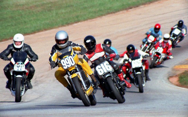 Davis, John - GNF '84 John Davis (No. 990 Yamaha RZ350) leads a group of riders in the C Production Novice race in the 1984 WERA Grand National Final at Road Atlanta. (Larry Lawrence photo)