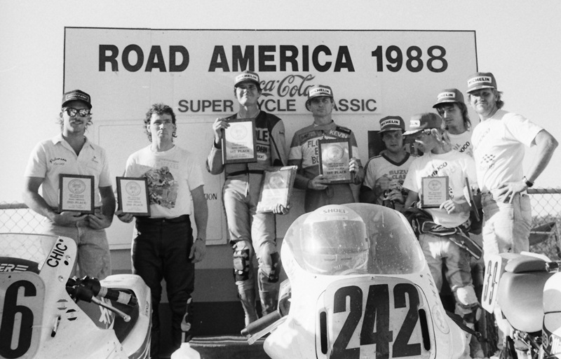 Elkhart GTU '88 The GTU podium at the 1988 EBC Brakes Endurance Series race at Road America in June of 1988. Standing on the top rung of the podium is Team Longevity’s John Long (L) and his teammate Kevin Blais. (Larry Lawrence photo)