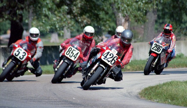 Bill Hougaboom (No. 426) on his Suzuki GSXR750 leads a pack of riders in what is probably a WERA B Production race at Blackhawk Farms Raceway in August of 1986. The pack Hougaboom leads includes Tim Morrissey (No. 854), Dan Chivington (No. 53), Steve Landrey and Doug Polen (No. 296). (Larry Lawrence photo)