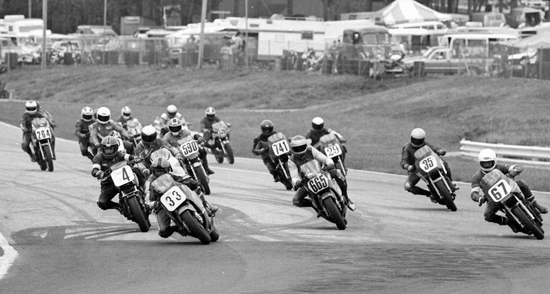Montemayor - GNF '85 This photo is the start of the C Superbike race with B.B. Montemayor (No. 33) leading the field into turn one at Road Atlanta during the ’85 WERA Grand National Finals. Steve Nardiello (in the back on bike No. 1) defended his ’84 championship and won this title for a second year in a row. (Larry Lawrence photo)