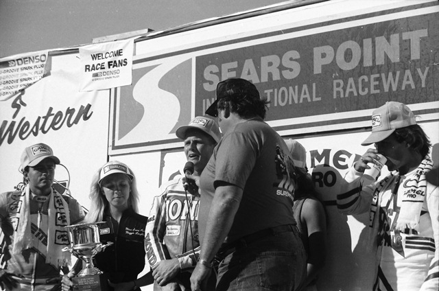 Spencer, Bill - Sears '86 "Big Bill" interviews Fred Merkel at his home road race track of Sears Point in 1986. (Larry Lawrence photo)