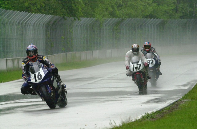 Gobert - Elkhart 2001 Anthony Gobert (No. 16) raced the factory Yamaha R7 back from a huge deficit after running off the track in the rain, and charged back to pass Jamie Hacking (No. 92 Yoshimura Suzuki) and Miguel Duhamel (No. 17 factory Honda) to earn a victory at Road America in June of 2001. (Riles & Nelson photo)