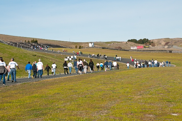 Engines were replaced by marching feet on Saturday, Jan. 7, at Infineon Raceway as more than 400 people turned out for the first "John's March Against Gastric Cancer" fundraiser.