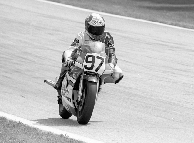Carter, Alan - Elkhart '87 Alan Carter’s Team MacLean Honda RS250, tail is cocked to the side late in the 1987 AMA 250 Grand Prix race at Road America. Carter managed fifth in spite of the bent pipe. (Larry Lawrence photo)