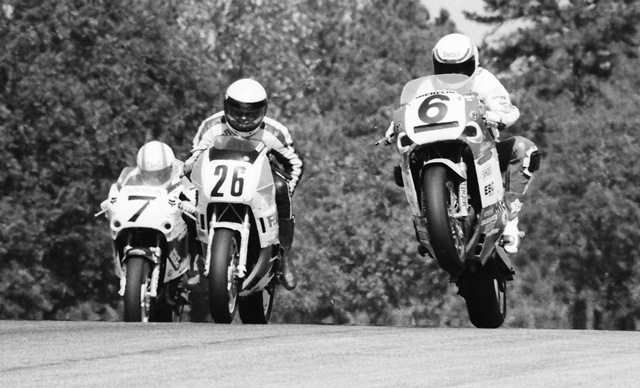 Hyper-Cycle - '89 GNF Hyper-Cycle Racing’s Jeff Farmer or perhaps Tommy Lynch (No. 6) blowing past No. 26 (I think that’s Bob Delie on what is probably a Yamaha FZR400, but I’m not sure what team) in the WERA National Endurance Final at Road Atlanta during the 1989 Grand National Final. If that’s not humbling enough, the FZR rider is about to get zapped on the other side by Dutchman Racing’s Mike Harth (No. 7). (Larry Lawrence photo)