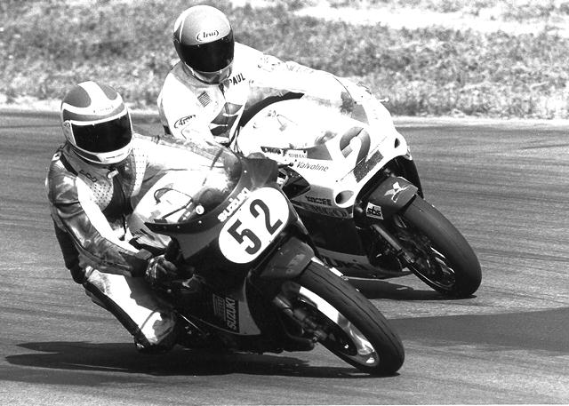Yoder - Bray Ray Yoder (No. 52)moves the 3 Guys Racing Suzuki inside Paul Bray on the Team Suzuki Endurance machine to take second in the WERA Eight Hour National Endurance in turn one at Grattan Raceway in July of 1989. (Larry Lawrence photo)