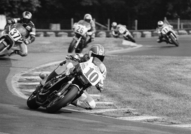 Then Superbike rookie Doug Chandler leads a talented group of riders that includes John Ashmead (No. 37), Jimmy Adamo (No. 26), Gary Goodfellow (No. 11) and Scott Zampach at the Mid-Ohio Superbike race in August of 1987. Chandler, who went on to finish fifth in this race. (Larry Lawrence photo)