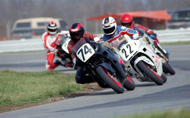 Meurer, Rbt - IRP '87 Robert Meurer leads Scott Russell (No. 22), Martin Miller (red helmet) and Ron Ewerth (No. 21) in a WERA sprint race at Indianapolis Raceway Park in April of 1987. (Larry Lawrence photo)
