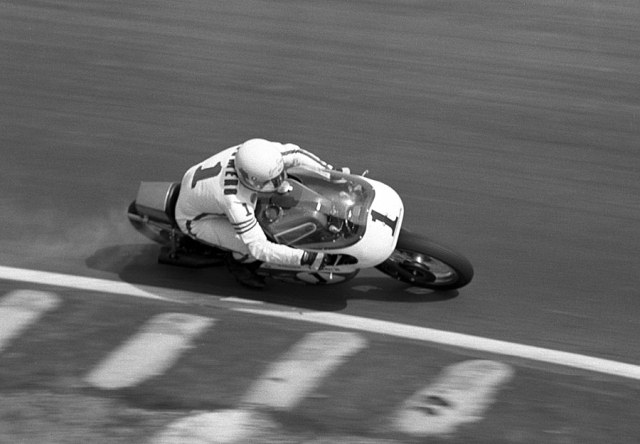 Romero by Bud Turner-sm Gene Romero taking a turn on the factory Triumph Trident in the AMA National at road Atlanta in April of 1971. Romero finished sixth. (Bud Turner Collection)