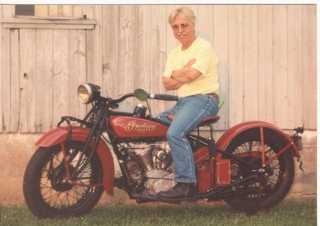 Me on Dad's 101 Today 001 Donald Barnes was losing his battle to cancer, but he still found time to point out a place on the old Indian to his son Larry that needed attention. "and I knew he was reminding me to take care of the bike when he was gone," Larry said. (Larry Barnes Collection)