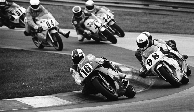 Robbie Petersen is leading the pack during the Mid-Ohio AMA 250 Grand Prix final. Following Petersen is Martin Miller (No. 98), Brad Sawyer (No. 43), Rick Tripodi (No. 44) and Andrew Trevitt (No. 31). But wait a second! Look on the far inside of the track, just entering the turn and notice No. 74 Himmelsbach dangling his leg as he brakes. It’s indisputable photographic evidence that Bill invented the leg dangling technique years before Val Rossi. Here’s a big Rider Files salute to you Bill! (Larry Lawrence photo)