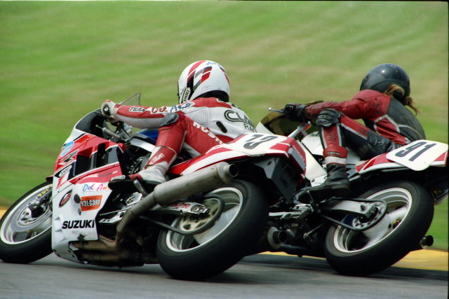 Pridmore - Grattan 7-90 Jason Pridmore running his CLASS Racing Suzuki GSXR1100 around the outside of the Yamaha FZR400 of Team Dreaded in during a Kerker/SBS WERA National Endurance race at Grattan Raceway in July of 1990. (Larry Lawrence photo)