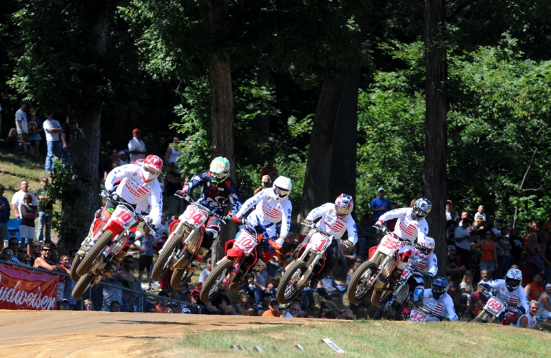 Vanderkuur - Peoria '11 A group of AMA Pro Singles riders take the jump together at the Peoria TT in August of 2011. Leading the pack is Stephen Vanderkuur (10J) followed by Andrew Smith (84P), Briar Bauman (10Z), Dustin Cassidy (41P), William Cato (35C), Nick Daniels (32P) and Hayden Gillim (69C). (Larry Lawrence photo)