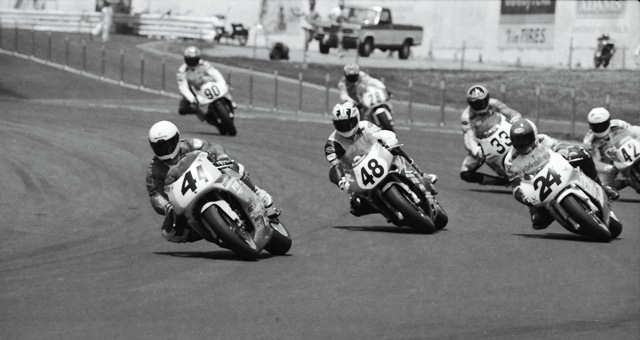 Bartlow, Jay - Atl F-USA '93 Jay Bartlow (No. 44) races his Virginia Breeze Yamaha into turn one during a WERA Formula USA race at Road Atlanta in May of 1993. Bartlow leads a talented group of riders that includes Kevin Rentzell (No. 48), Chuck Graves (No. 24), Takahito Mori (No. 42), Tray Batey (No. 33), unknown rider (No. 28) and Chuck Sorensen (No. 90). (Larry Lawrence photo)
