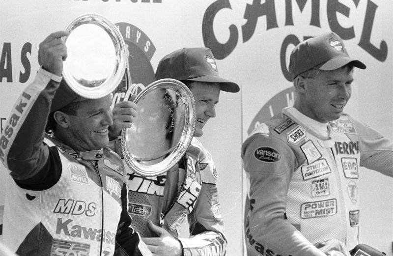 (L to R) Steve Crevier, Jamie James and Gerald Rothman celebrate on the winners’ rostrum after the AMA 600 Supersport race at Road America in June of 1994. (Larry Lawrence photo)