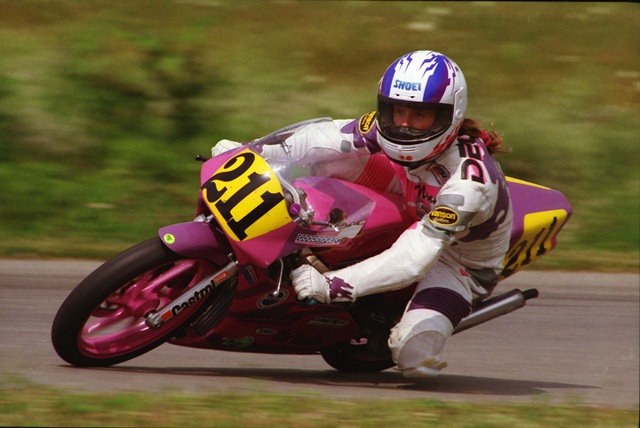 Dewar - Putnam '93 Nancy Dewar corners her Honda RS125 in a WERA sprint race at Putnam Park Road Course in July of 1993. Dewar was a rapidly improving road racer in ’93. In May of that year she came to Putnam and scored a best of fourth-place. Two months later she won two races. (Larry Lawrence photo)