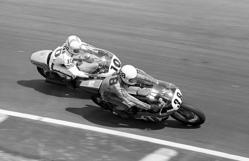 Gardner - Nixon John Gardner (No. 38) races through a turn on his Harley-Davidson at Road Atlanta as Gary Nixon (No. 10) comes around the outside on his factory Triumph. The photo was taken during the AMA Road Race National at Road Atlanta on April 25, 1971. (Bud Turner Collection)