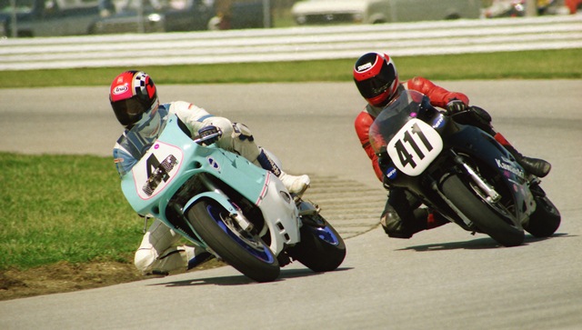 Brian Lantz (No. 4), on his Suzuki GSXR750, leads the Kawasaki ZX7 of Scott Kocan (No. 411) through the carousel at Indianapolis Raceway Park in a WERA Sprint race on April 4, 1993. This is likely the Formula One final, where Lantz just beat out Kocan to finish fourth. (Larry Lawrence photo)