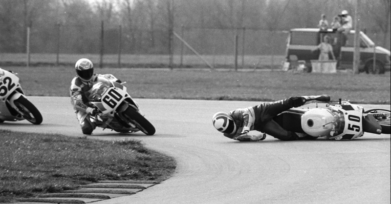 Reed 1 Mike Reed loses the front end on his Suzuki and hits the ground in front of Kurt Hall (60) and Ray Yoder (52) in a WERA sprint race at Indianapolis Raceway Park in 1991. (Larry Lawrence photo)