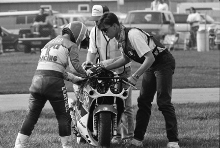 Reed 2 The aftermath – instead of just sliding on its side it appears Reed’s Suzuki did at least one flip before coming to a rest, smashing the top part of his fairing. (Larry Lawrence photo)