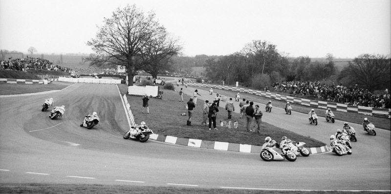 Shaw's Hairpin at Mallory Park in England is one of, if not the tightest turn in road racing. This photo is one I took from a British Series 125GP Series. Neil Hodgson is in this group somewhere. (Larry Lawrence photo)