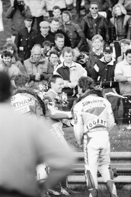 Stringer, Ray - Match Races 1991 Ray Stringer (center) celebrates victory at Mallory Park along with British teammates Jamie Whitham and Carl Fogarty during the 1991 Transatlantic Match Races. (Larry Lawrence photo)