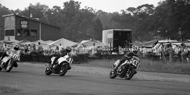 Talladega WERA Endurance 6-86 Kevin Rentzell, on the Jam-Up Racing Yamaha FZ600, leads the U-2 Racing Yamaha FZ750 of Adam Smith and the Team Hammer Suzuki GSXR1100 riding by Doug Toland early in the WERA National Endurance race at Talladega Gran Prix Raceway in June of 1986. (Larry Lawrence photo)