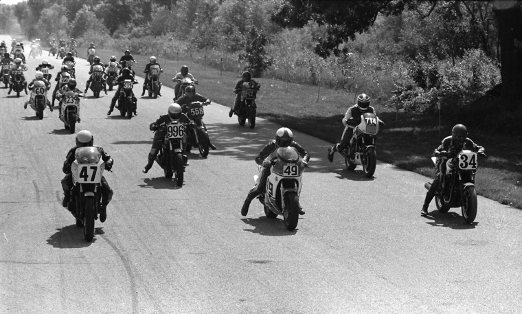 The entire grid of a WERA B Superbike race at Blackhawk Farms in August of 1984, blast off at the drop of the green flag. Bill McGuire (No. 47) won the race over Ed Key (No. 34) and Steve Tayler (No. 49). Tom Forsterling (No. 714) won the novice division. (Larry Lawrence photo)