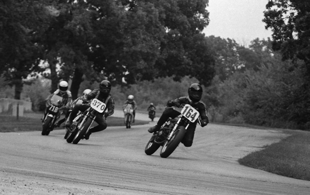 Keith Carlson, on a Suzuki 400, leads Lawrence Iles, on a Honda 350, Brian French, on a rare Suzuki RG250, and I also see on the white No. 77 bike, Tim Freeman, who raced a Honda 125. This photo was taken at Blackhawk Farms Raceway in August of 1984 at a WERA sprint race. (Larry Lawrence photo)