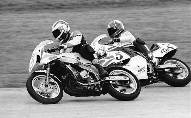 East - Smith - Roebling 1989 Royale Racing’s Jim East gets lapped by Team Suzuki Endurance rider Mike Smith during the WERA/EBC Brakes Six-Hour National Endurance at Roebling Road Raceway in March of 1989. (Larry Lawrence photo)