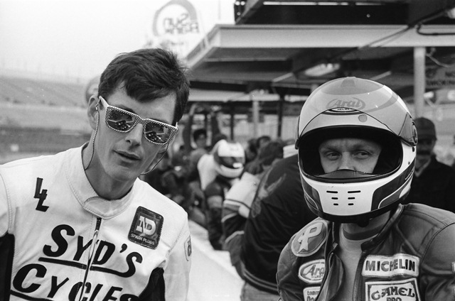 Gross - Johnson - Daytona 1987 Douglas Gross (sunglasses) and Pete Johnson pose for a photo just before the start of the 1987 Daytona Pro Twins Modified Production race, one in which the two rider would battle each other for the win. (Larry Lawrence photo)