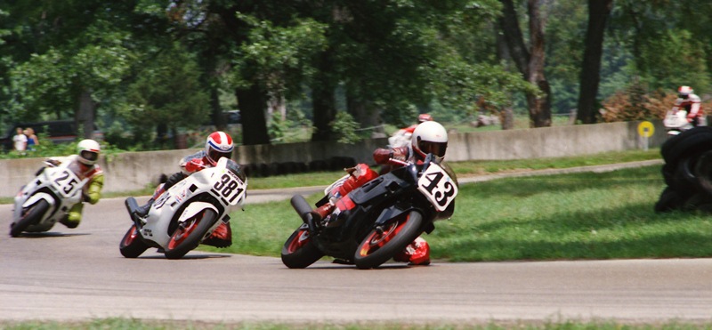 Hampton, Terry - Blackhawk - July '87 Terry Hampton leads Jerry Washburn (No. 381), Jim Still (No. 25) and a couple other riders through turn four in what is probably a Honda contingency money paying WERA C Production race at Blackhawk Farms in July of 1987. (Greg Sickmeier photo)