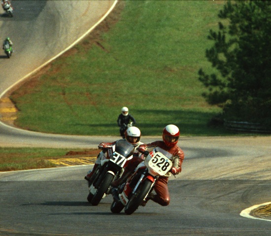 Harman, David - GNF 1985 David Harman (No. 528) leads Ben Beasley (No. 371) at the 1985 WERA Grand National Final in what is probably the C Production final. The Yamaha RZ350 and the Honda VF500 Interceptor seemed to be fairly evenly matched bikes during this era. (Larry Lawrence photo)