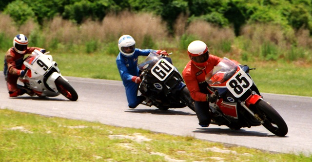 Hyatt, Hall, Stevens - Roebling '87 Danny Hyatt (No. 85) leads Kurt Hall (No. 60) and Thomas Stevens (No. 9) in the early laps of a WERA sprint race at Roebling Road Raceway in May of 1987. (Larry Lawrence photo)