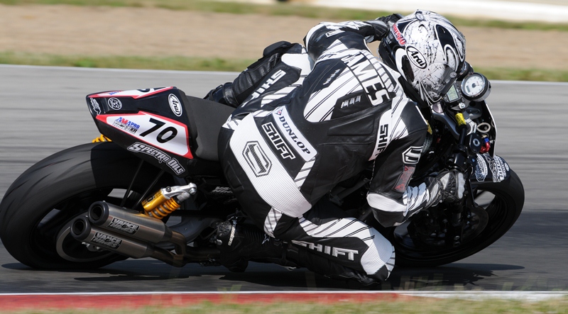 James, Paul - Mid-O 2011 Paul James races his Hoban Brothers/Harley Davidson of Appleton-backed XR1200 at Mid-Ohio last year. If you look closely enough on his instrument cluster you can see that James clocked a 1:43.46 on the previous lap. (Larry Lawrence photo)