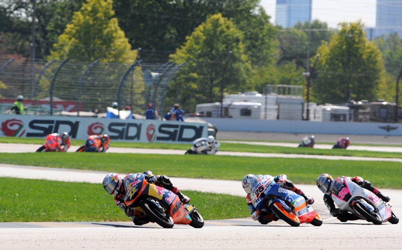 Thrilling Moto3 finish with Luis Salom (No. 39) coming from third to first on the final lap. Here on the final lap Sandro Cortese leads Maverick Vinales and Salom. Vinales crashed on the final set of turns. (Larry Lawrence photo)