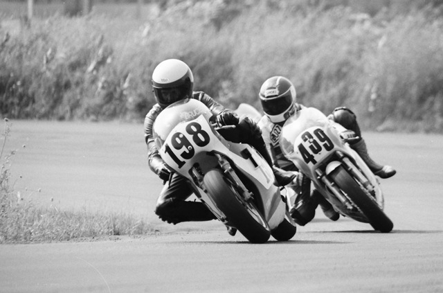 Peterson, Bruce - Grattan 7-86 Bruce Peterson leads eventual race winner David Merritt in a WERA Formula 2 race at Grattan Raceway in July of 1986. Peterson was racing an Armstrong GP bike. (Larry Lawrence photo)
