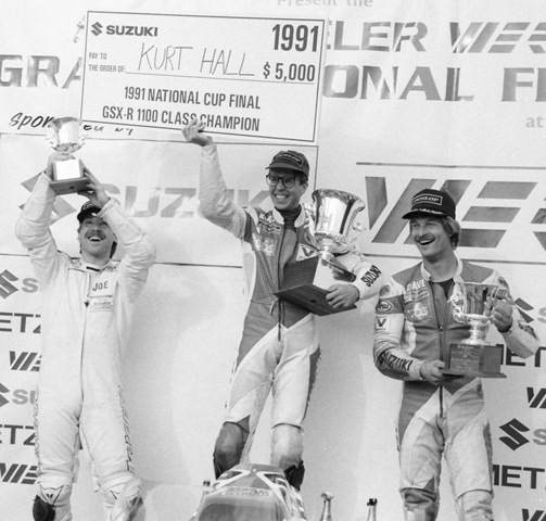 Pittman - Hall - Deveau - 1991 GNF Louisville, Kentucky native Kurt Hall celebrates his victory in the 1991 Suzuki GSXR1100 Cup Final over two West Coast riders, runner up Dave Deveau (right) from Sebastopol, California, and Joe Pittman (left) of Bellevue, Washington. (Larry Lawrence photo)