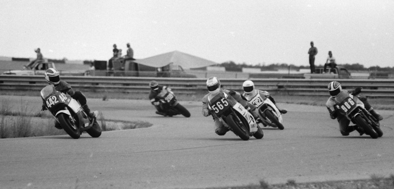 Spears, Gary - Texas World 10-86 Gary Spears (No. 565) is on the charge on his Yamaha FZ600 as he leads a pack of riders in a CRRC C Superbike Novice race at Texas World in October of 1986. Spears is going around Russell Collins (No. 442), who seems to be off the throttle for some reason. (Larry Lawrence photo)