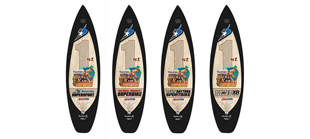 M1-PowerSports-BigKahunaSurfboard Thanks to a collaboration by partners Motorcycle-Superstore.com and Roland Sands, M1 PowerSports is excited to unveil the unique surfboard trophies which will be awarded to the top GEICO Motorcycle AMA Pro Road Racing riders following each of this year's remaining Triumph Big Kahuna Nationals presented by Dunlop Tire and LeoVince.