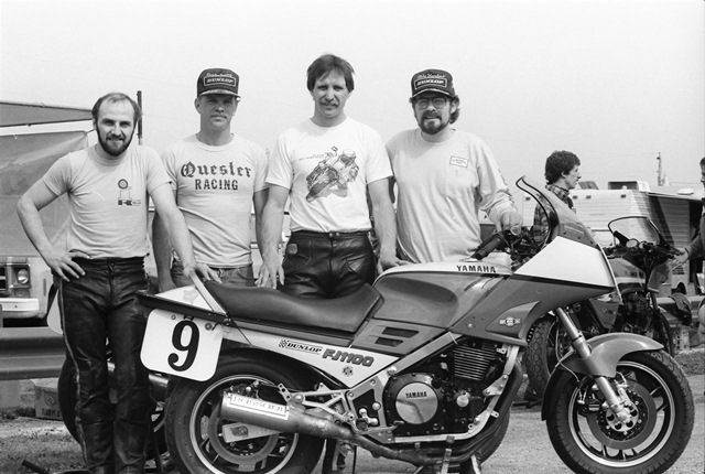 Quester-Sullivan - 1985 This is the Quester-Sullivan race team at Indianapolis Raceway Park in April of 1985. I believe the team had just won the Heavyweight Production class of the WERA National Endurance Series race. I don’t know anyone in this photo other than team captain Mike Harlow (with beard and glasses). (Larry Lawrence photo)