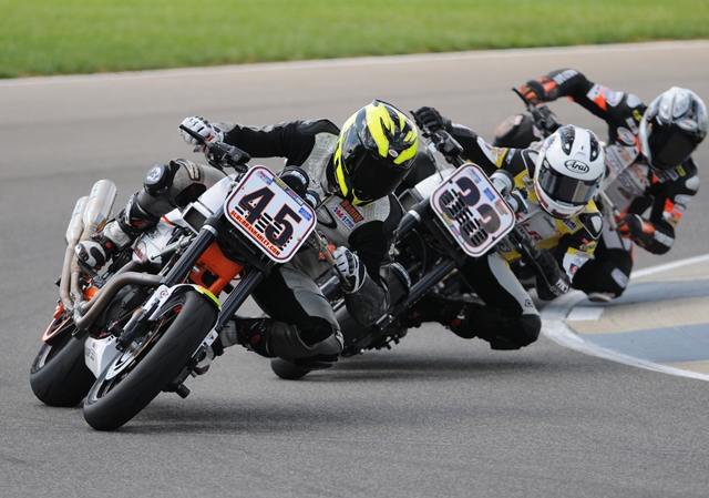 Carlson (No. 45) getting on the gas early in a turn in the XR1200 race at Indianapolis. (Larry Lawrence photo)