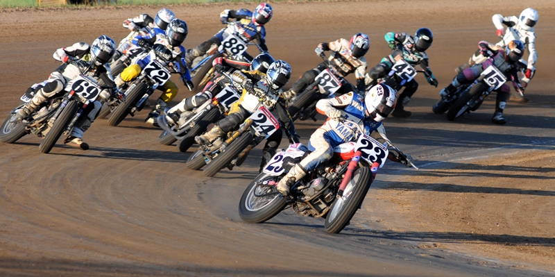 Jeffrey Carver, Jr. (No. 23) leads the pack through turn four in a Heat race during the AMA Grand National at I-96 Speedway in July of 2011. Bryan Smith (No. 42) won the race. (Larry Lawrence photo)