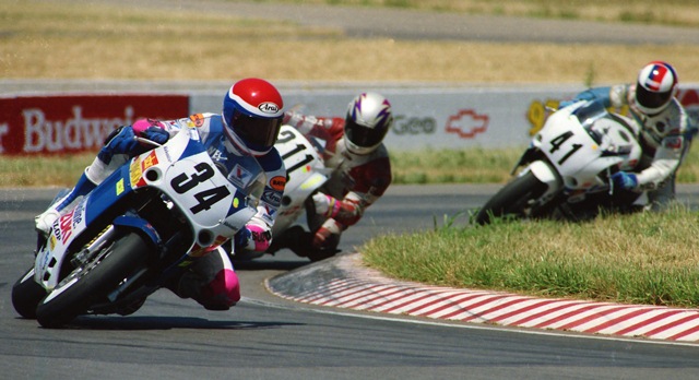Cooley, Wes - Topeka FUSA 7-90 Wes Cooley races a Valvoline Suzuki ahead of a couple of other riders in the WERA Pro Formula USA at Heartland Park Topeka in July of 1990. (Larry Lawrence photo)