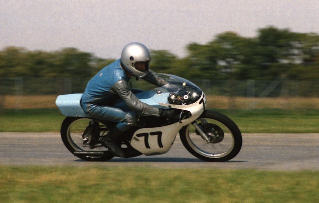 Freeman, Tim - IRP 9-84 Tim Freeman races his Honda 125 GP bike around the carousel at Indianapolis Raceway Park during a WERA spring race there in September of 1984. (Larry Lawrence photo)