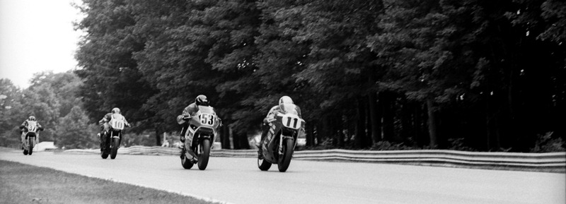 Goodfellow - Elkhart Lake Gary Goodfellow (No. 11) leads Dan Chivington (No. 53), Doug Chandler (No. 10) and John Ashmead (No. 37) at the 1987 Road America AMA Superbike race. (Larry Lawrence photo)