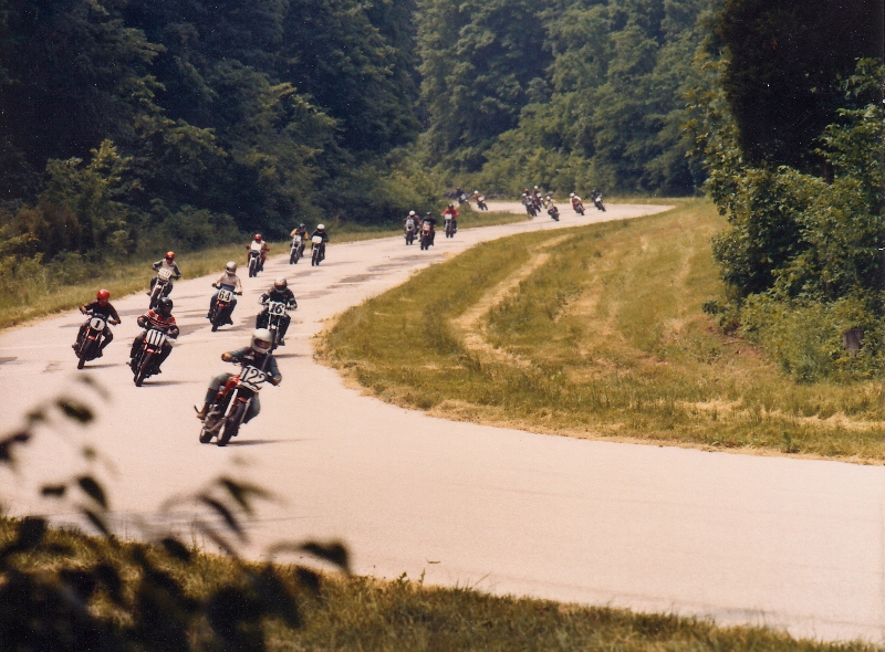Lance Wentzville - leading on Vision 5-30-82-sm Lance David leads a pack in a road race at Mid-America Raceway in Wentzville, Missouri in May of 1983. This photo shows perfectly the crude condition of the track and the denseness of the surrounding woods. (Neil Tolhurst photo)
