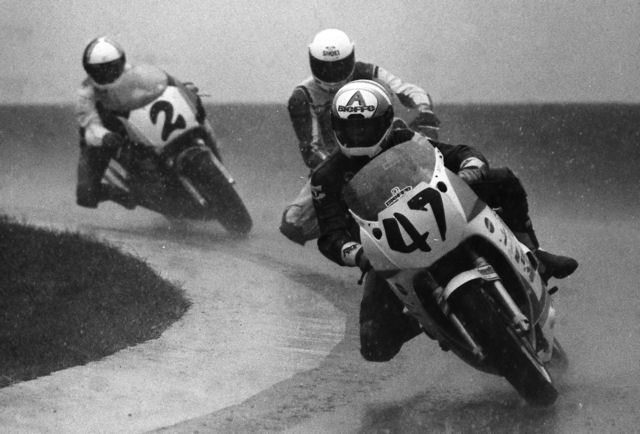Fenwick, Andy - Grattan F-USA 7-90 Andy Fenwick races a Human Race Team Yamaha ahead of Marty Miller and teammate Steve Rodden. I clearly remember this photo from the Grattan round of the WERA Formula USA Series in July of 1990. It began to rain during the final and it came down in buckets. It was probably the hardest rain I ever saw a race run in. (Larry Lawrence photo)